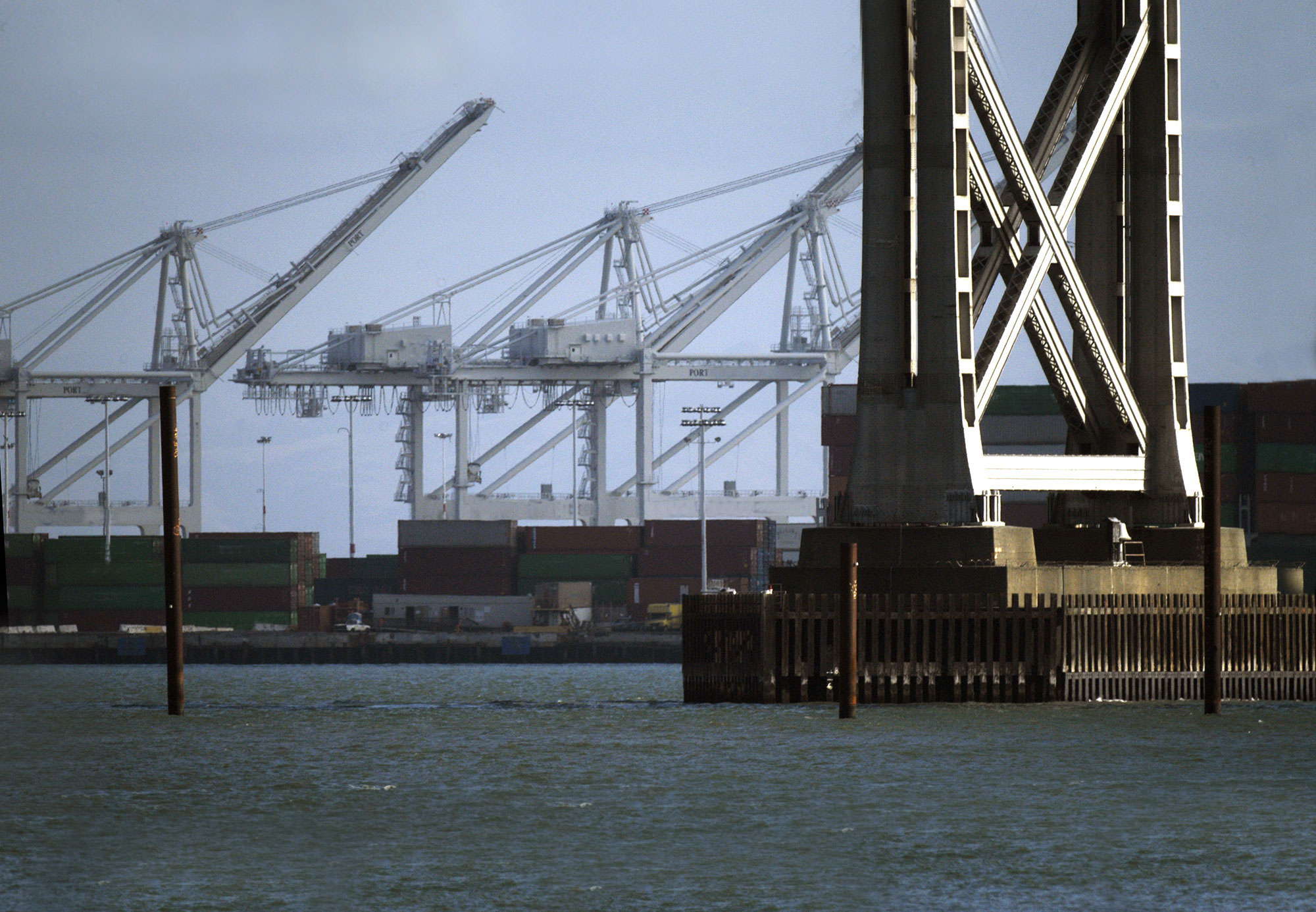 Cranes and pylons over water