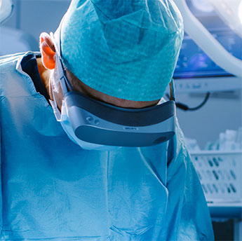 Doctor wearing scrubs and a virtual reality headset