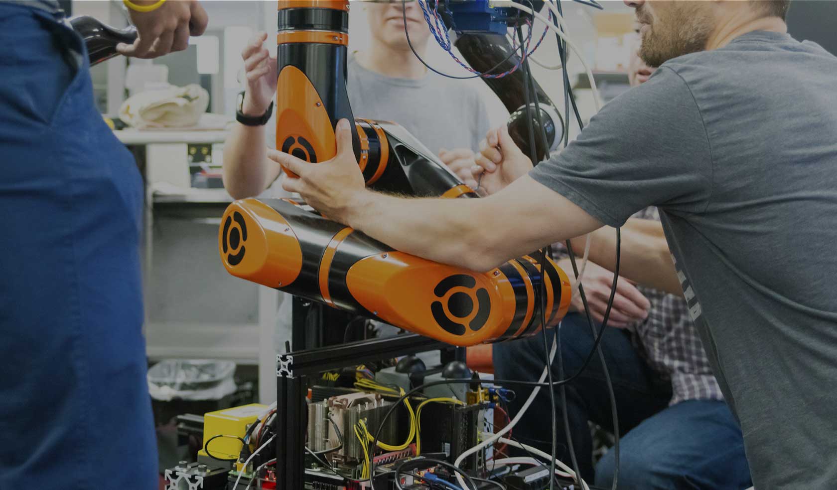 Person manipulating a robotic arm