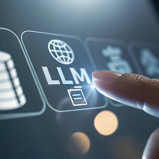 A finger pressing a glowing LLM button on a dark digital interface