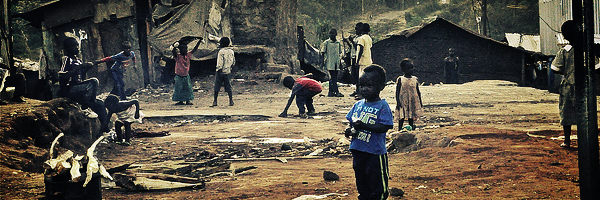 Poor children playing in street